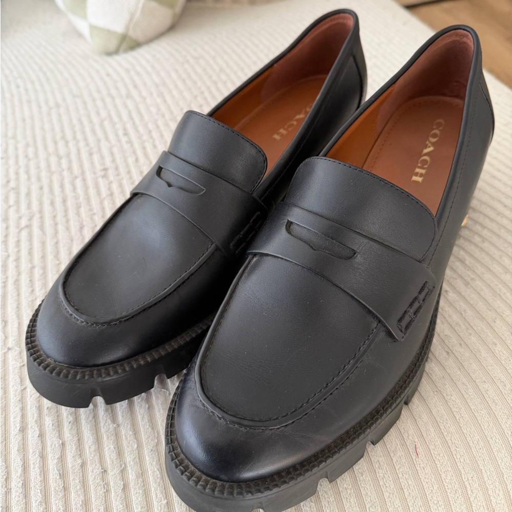 Coach Black Leather Women’s Slip-On Loafers.